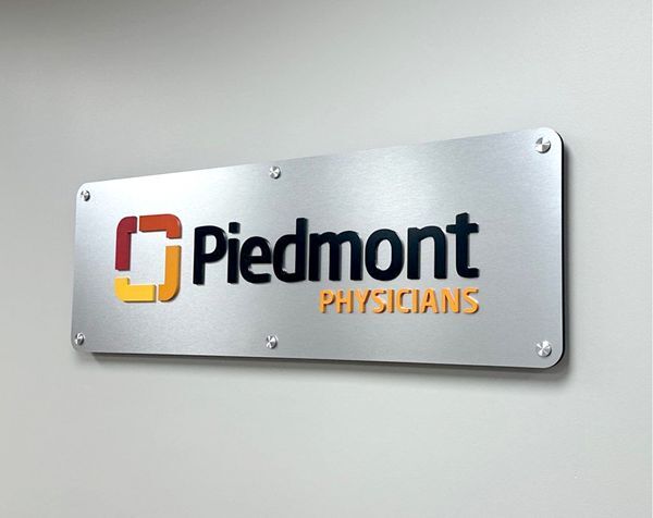 Interior wall mural and dimensional letter logo for a medical facility in Augusta GA