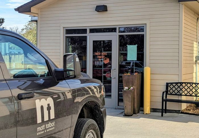 Matt Talbot's People Choice Food Pantry with vehicle in front
