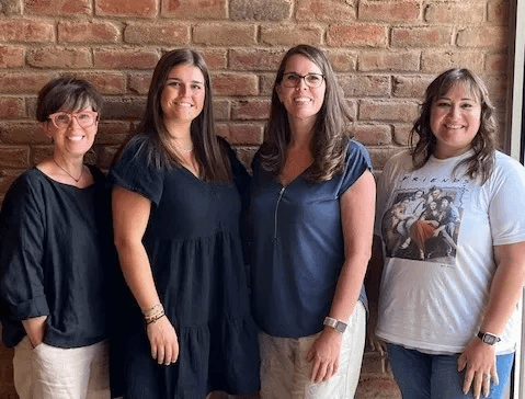 Leona Vrbanec (left), Lauren Skaggs (center left), Nicole Tucker (center right) and Kellie Cannon (right) used grant funds from the Licking County Foundation to travel the world this summer. (Photo by Ellie Owen, The Reporting Project)