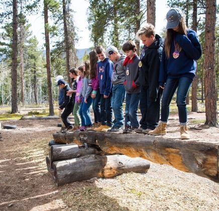 kids balancing on beam