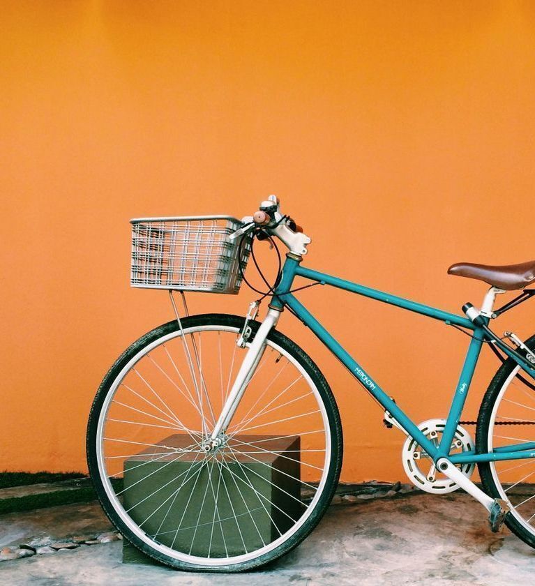 Bicycle Against Orange Wall