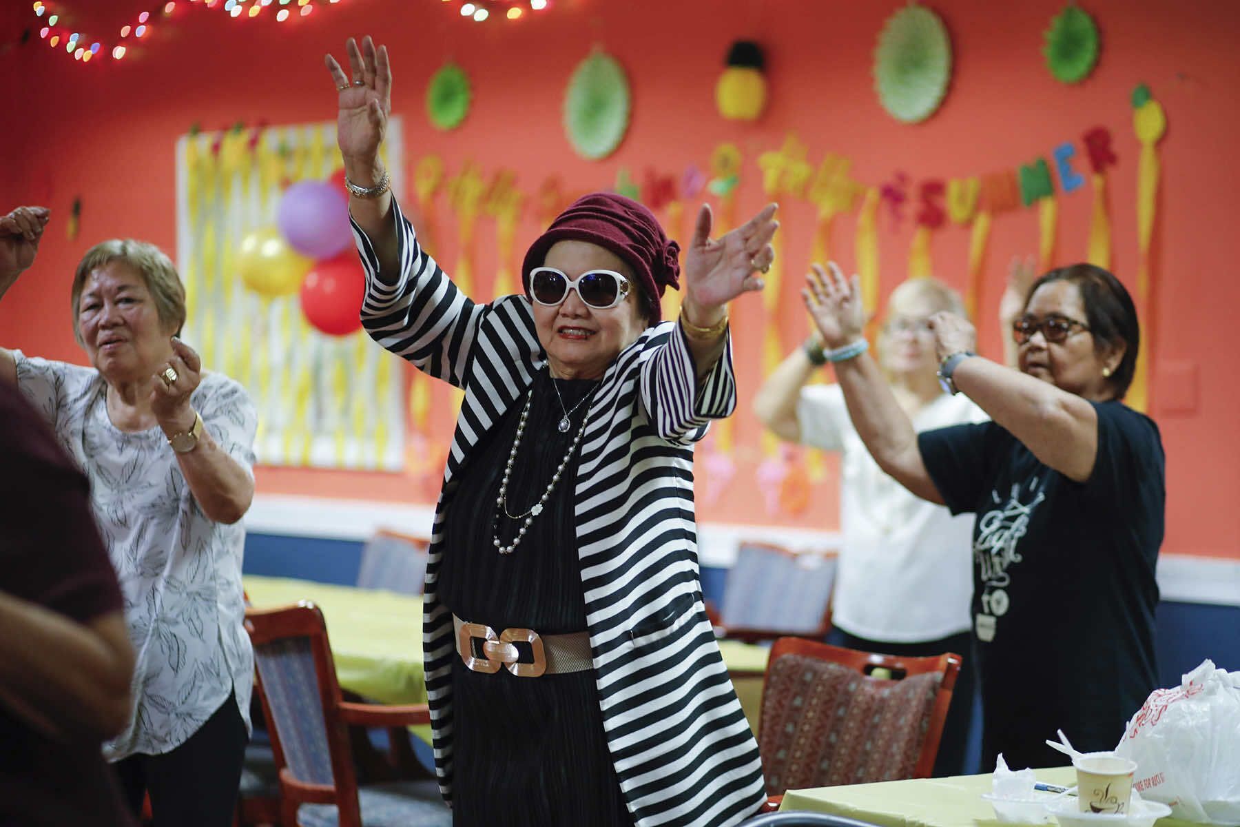 Battling isolation: How adult day centers became multicultural hubs for older people of color