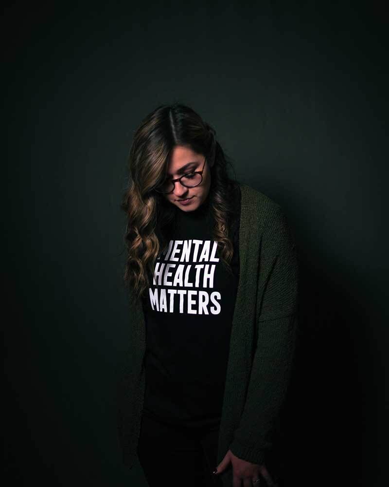 woman in mental health matters shirt