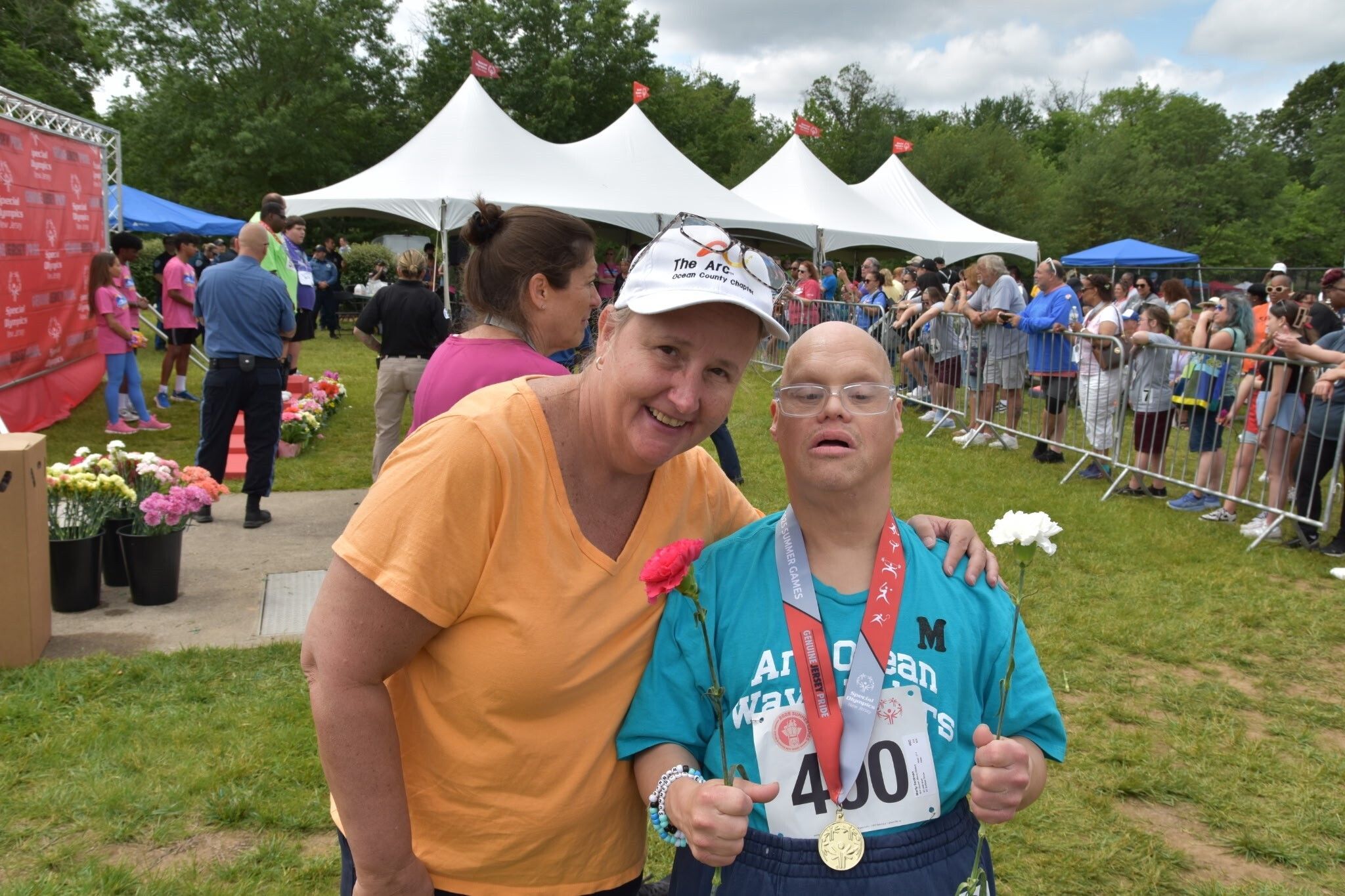 Executive Director Laura Williams & Gold Medalist Marty