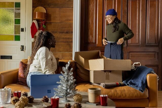  Friends smiling with boxes