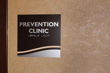 Aahs Signs And Graphics ADA-braille sign with custom design