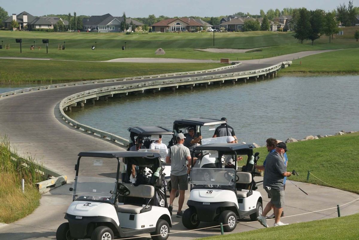 NDEPA members with golf cart