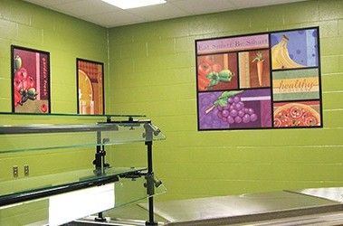 School serving line with illustrated food designs, custom signs, encourage healthy eating in students