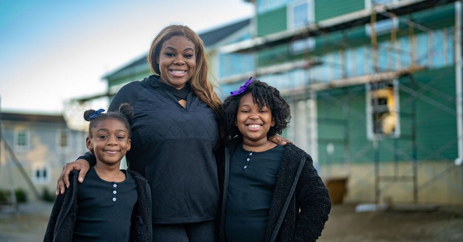 Families getting their keys to their Habitat homes.