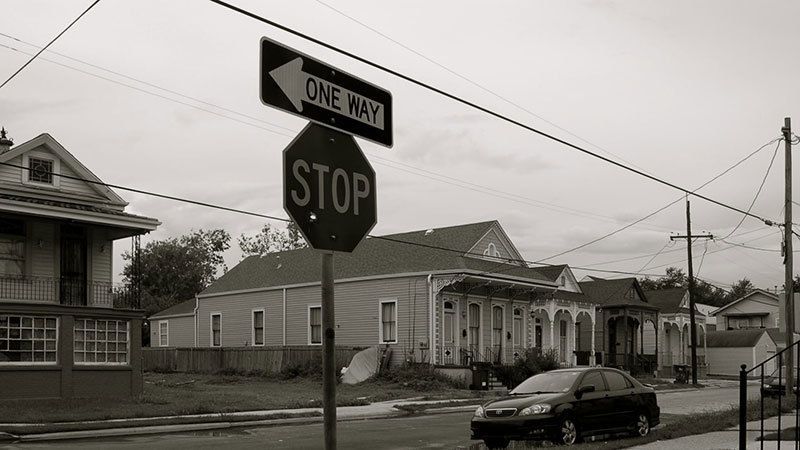 Stop sign in a neighborhood.