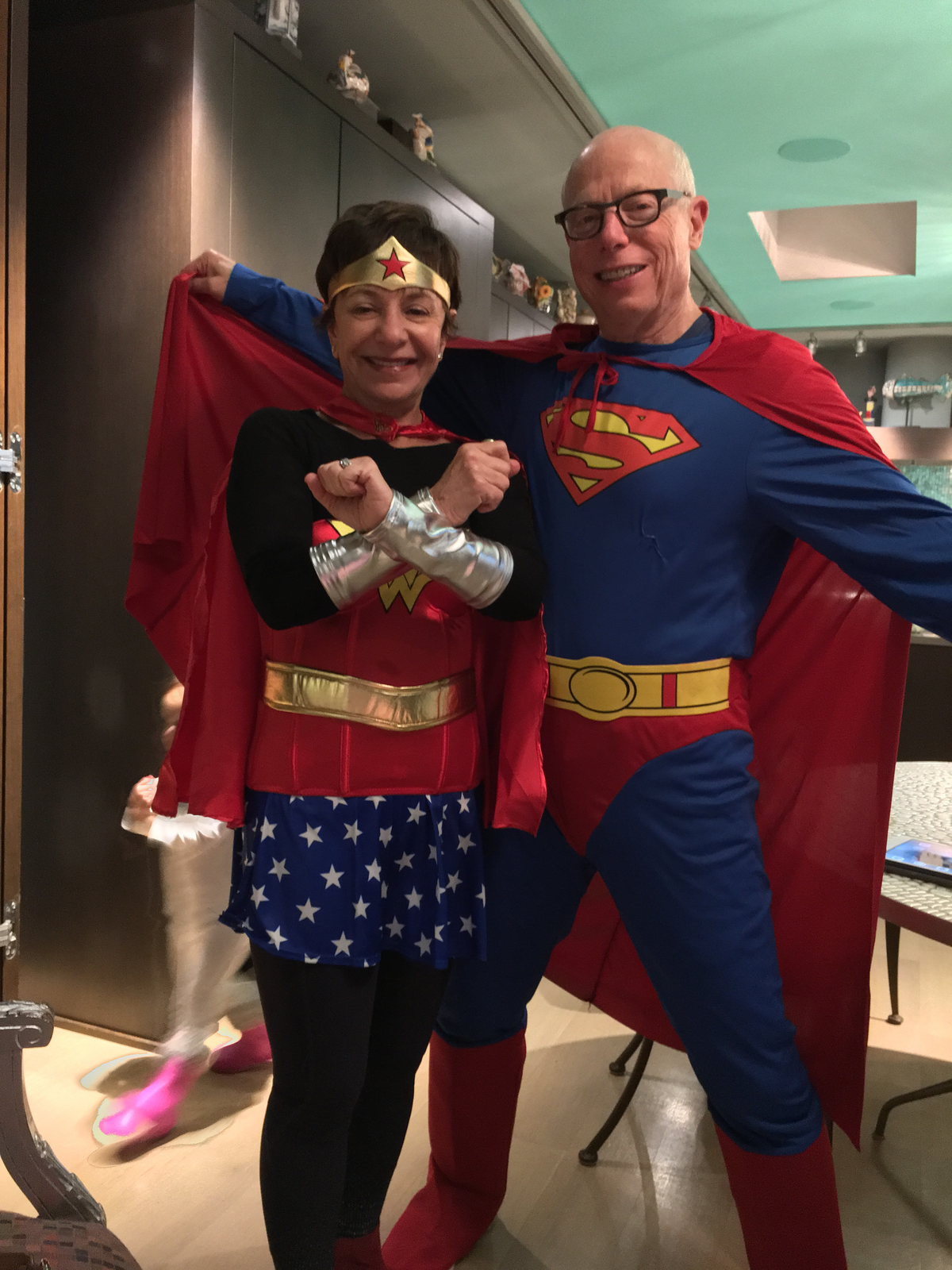Michele and Stan Rosen as Wonder Woman and Superman during Purim.
