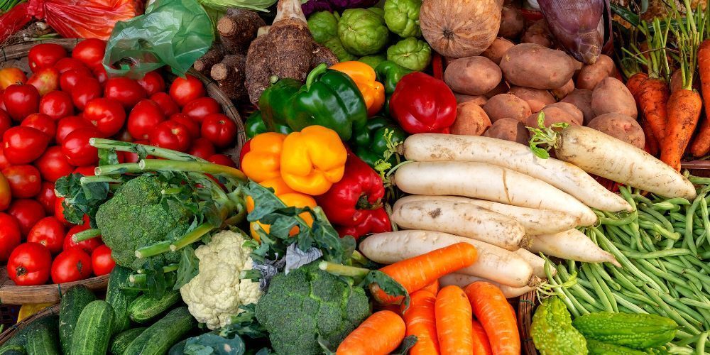 Overhead view of a bunch of different kinds of fresh vegetables