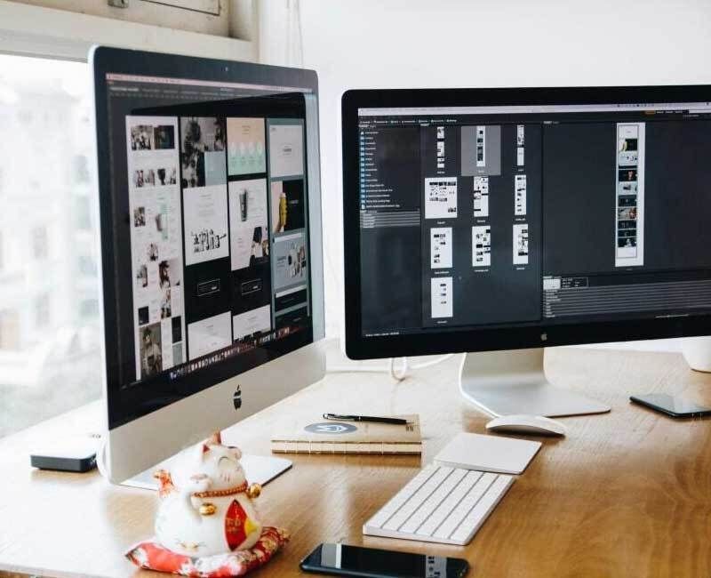 Large Computer Monitors on Desk