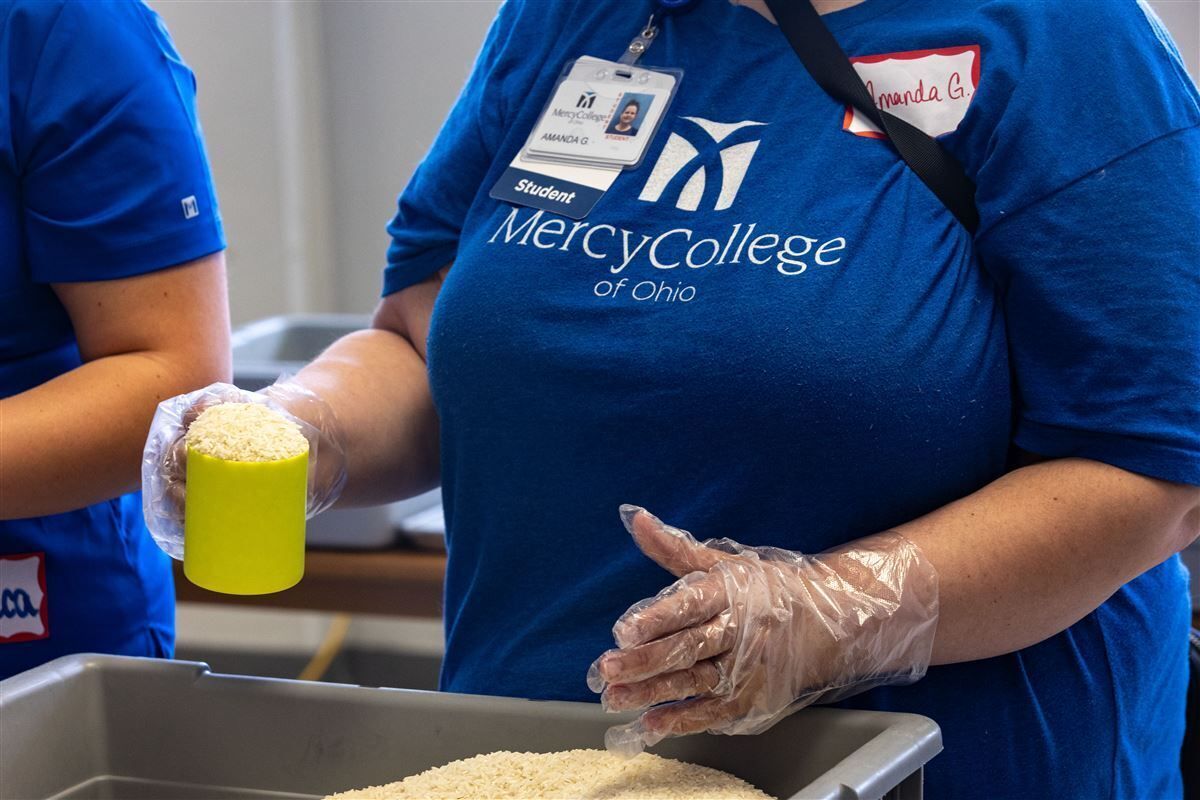 Faculty, staff, and students at Mercy College of Ohio packed meals for local and international communities during the college’s Heritage Week