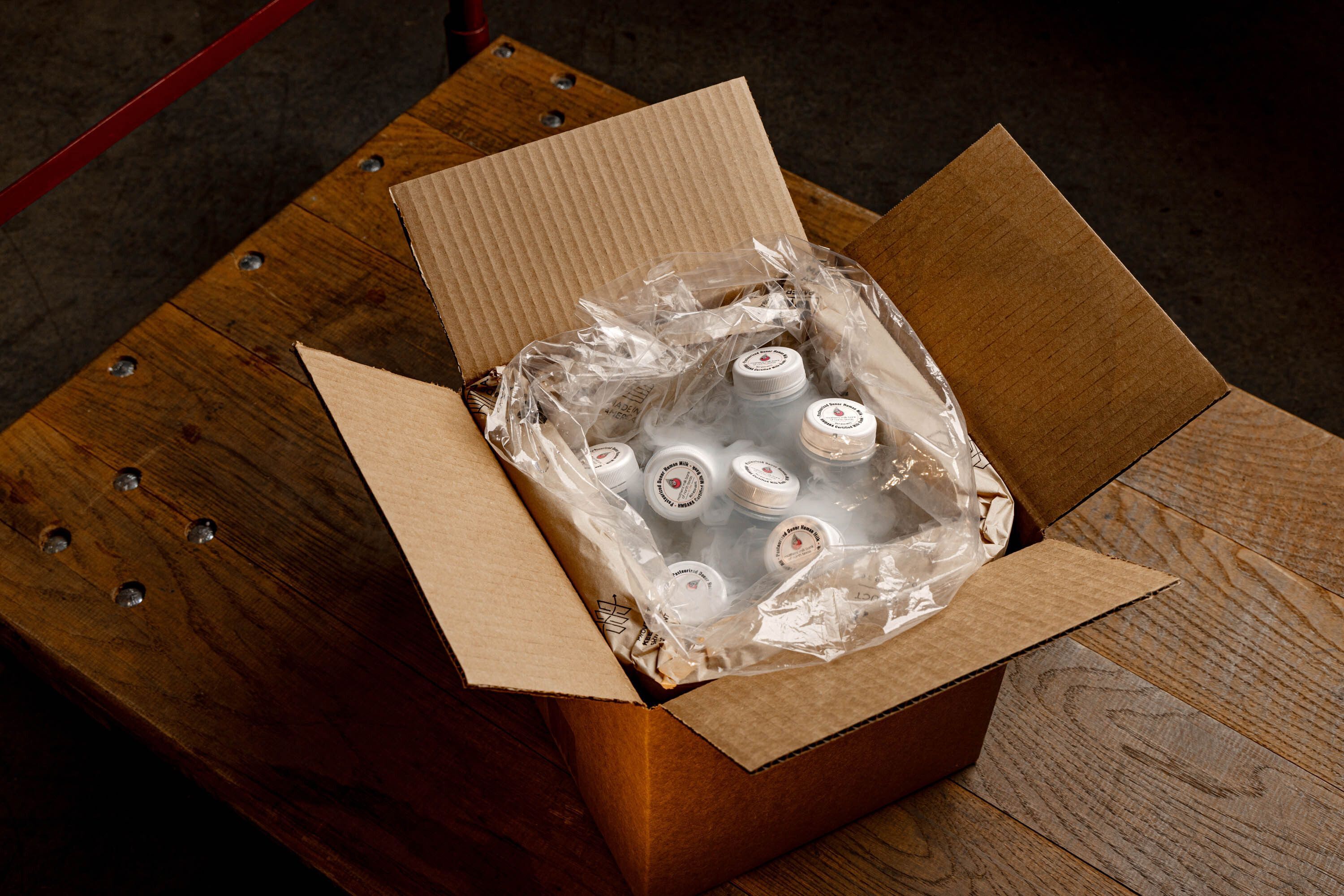 Donor milk bottles ready for shipping. 