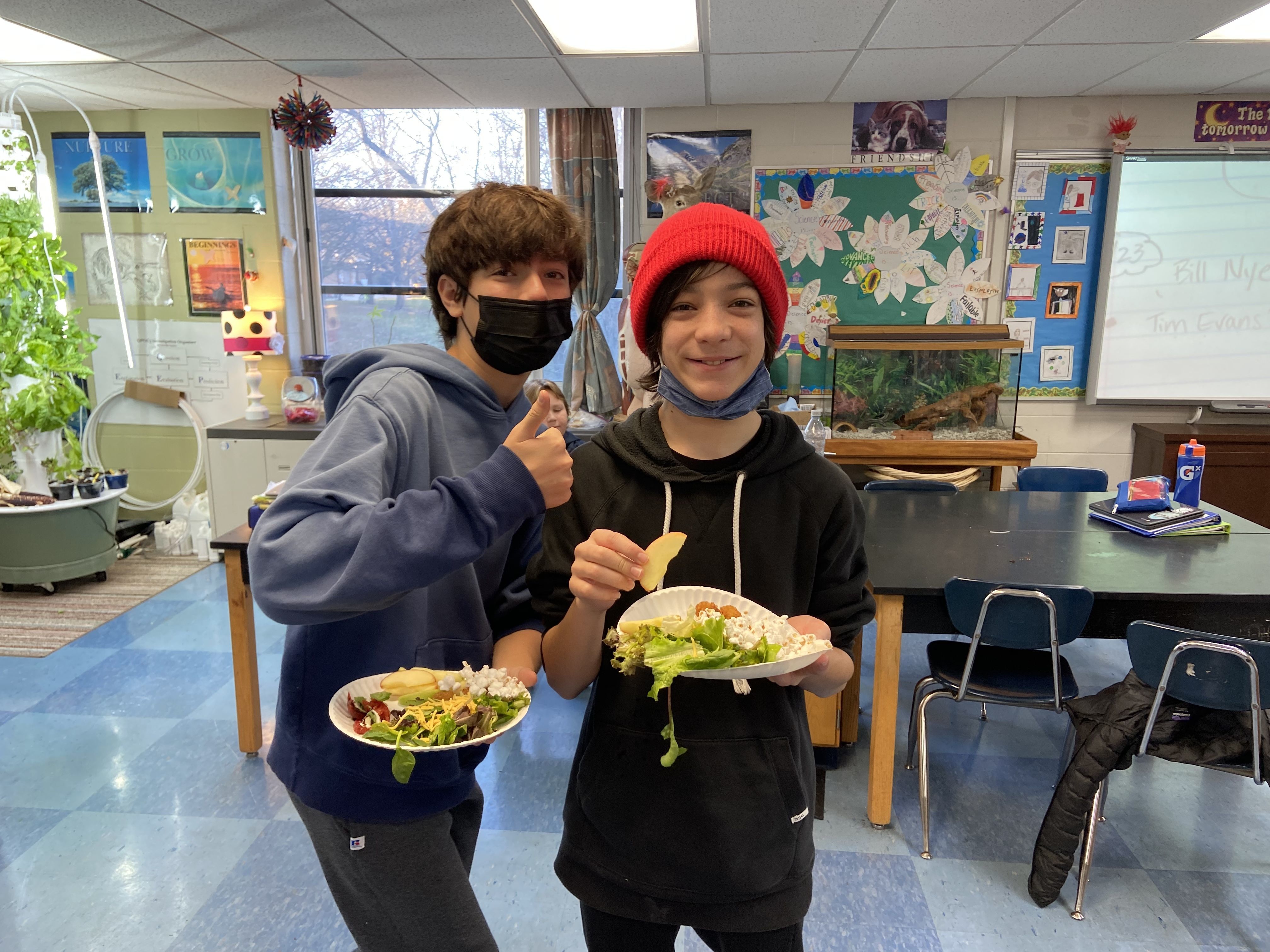 students with food from tower garden
