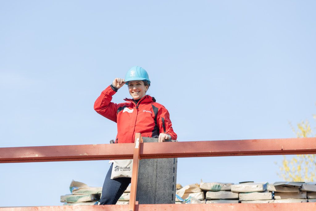 Habitat for Humanity of East and Central Pasco County calling for local veterans in need of critical roof repairs, featuring the Habitat logo, a silhouette of a saluting soldier in a patriotic shield, and contact information for the Development