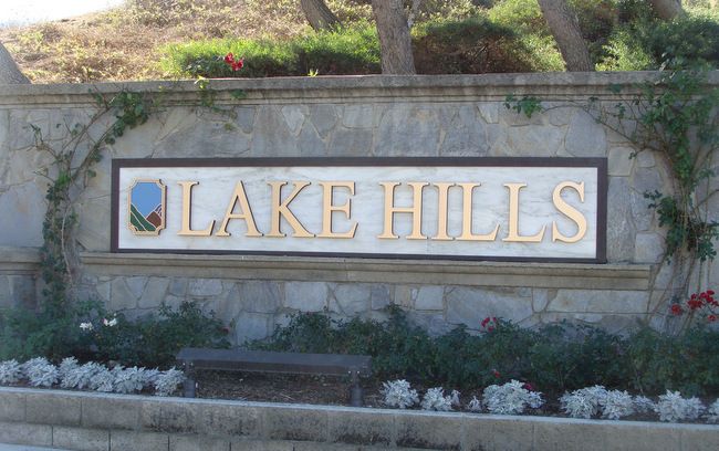 K20030 - Stone Monument Sign with Gold Letters and Carved Logo Scene