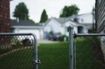 picture of gate opening to a house