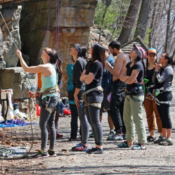 A group of climbers standing on the carriage road