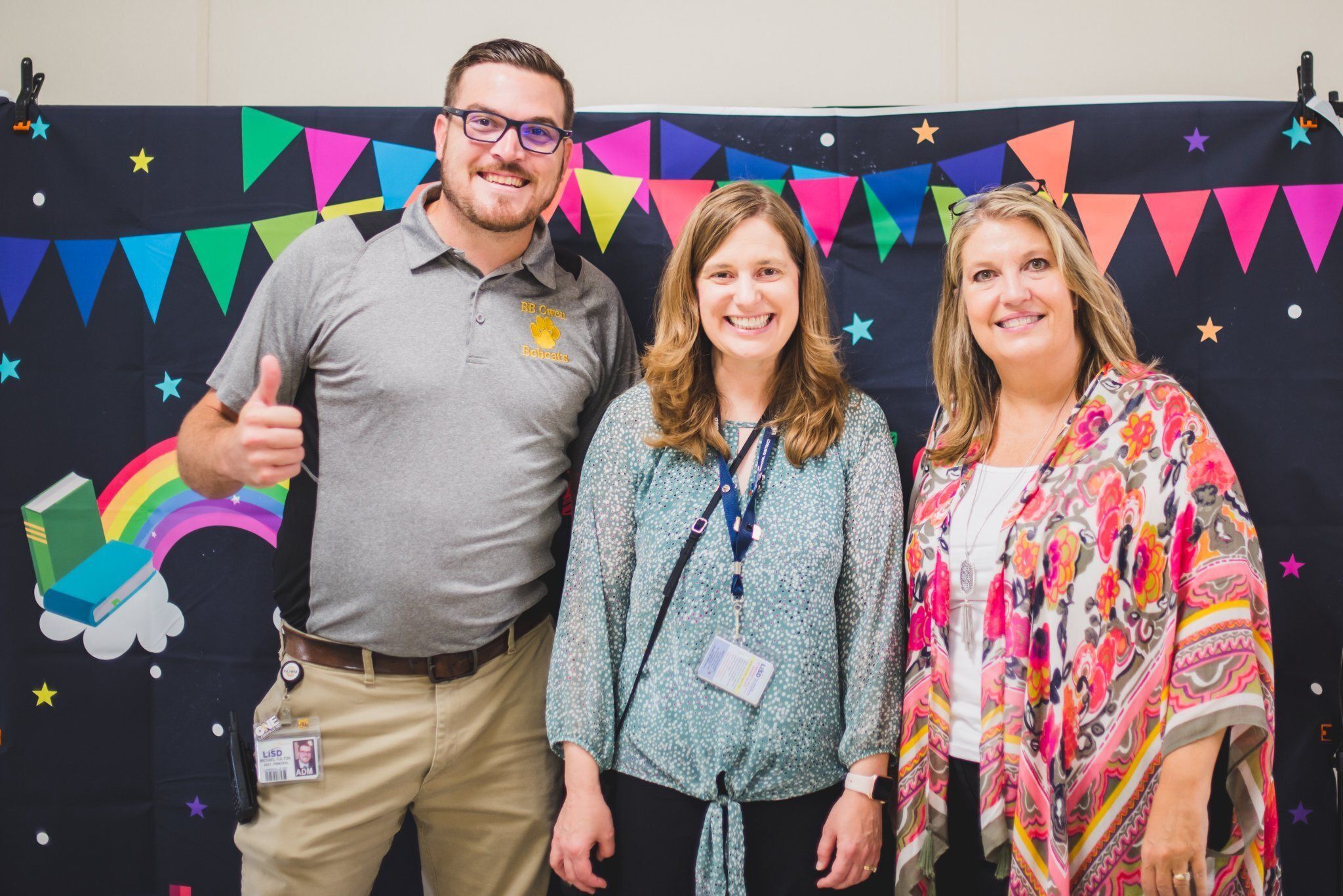 Michael Fulton Poses with Superintendent Lori Rapp and Principal Jennifer Barentine.