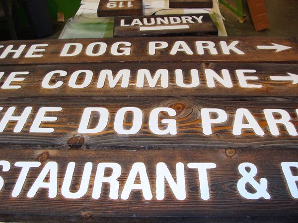 T29412 -  Rustic Carved Redwood Wayfinding Signs for a Hotel.