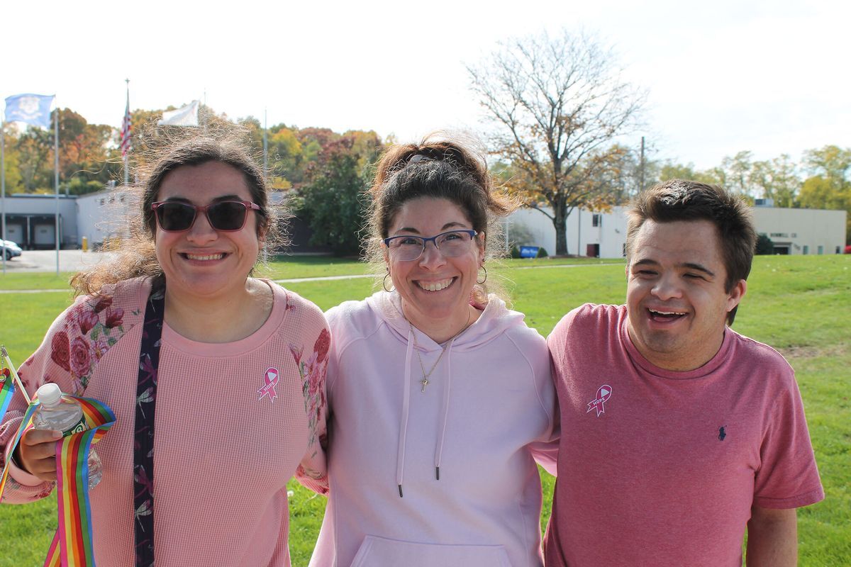 people served and staff smiling outside