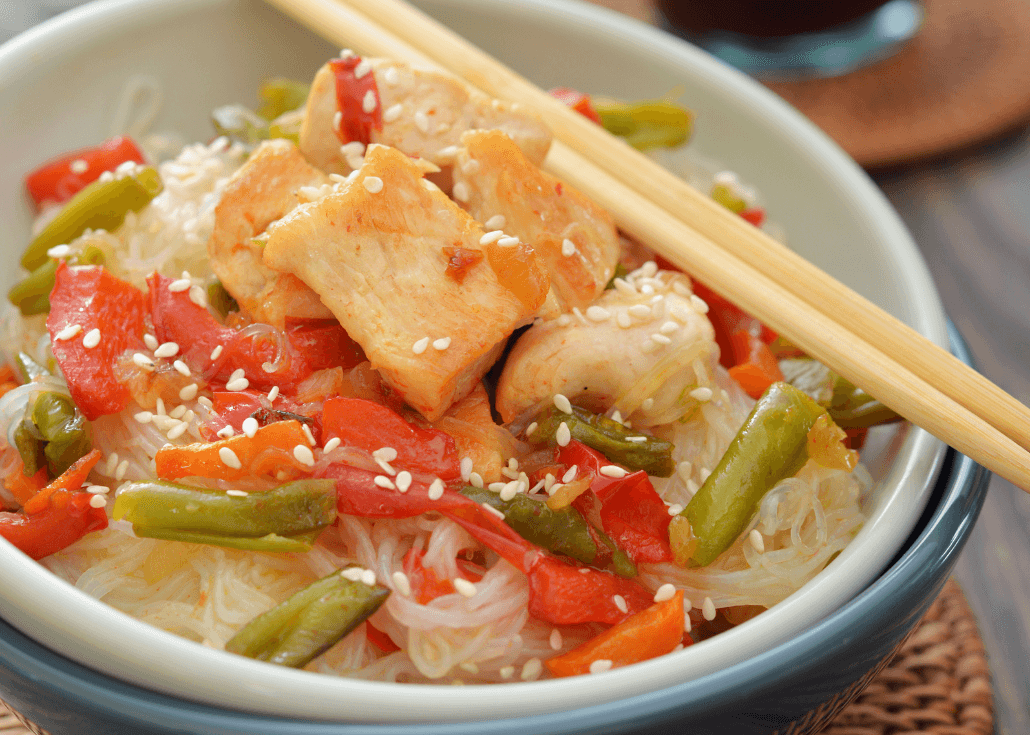 Pancit (Filipino rice noodles) with chicken and veggetables
