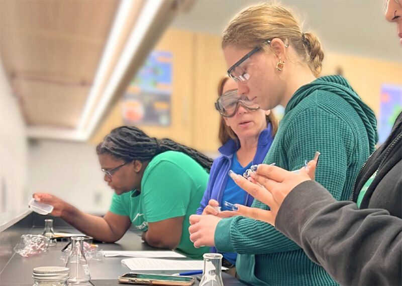 Students learning in a science lab.