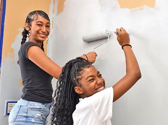 Volunteers painting