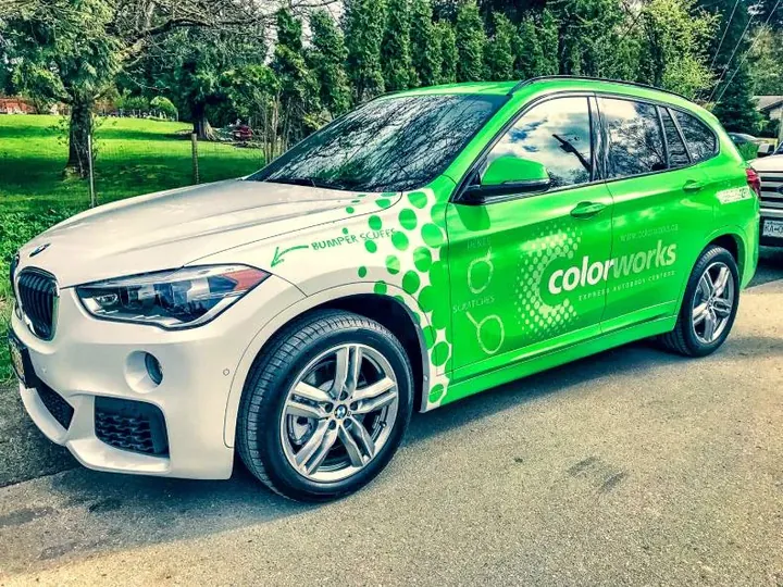 Branded vehicle graphics produced for a local business