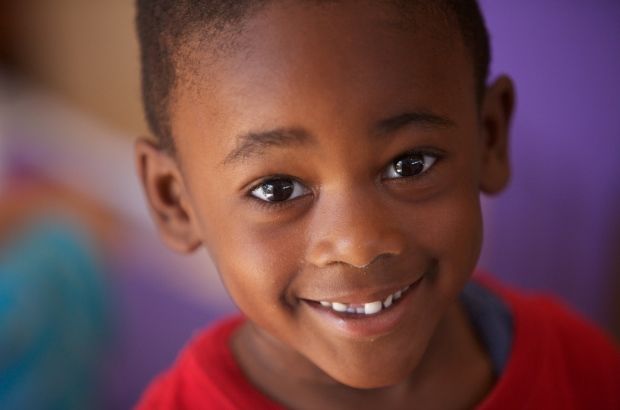 Smiling boy in child care subsidy program