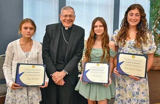 Three recipients of the Father Clem Hammerschmitt high school scholarship