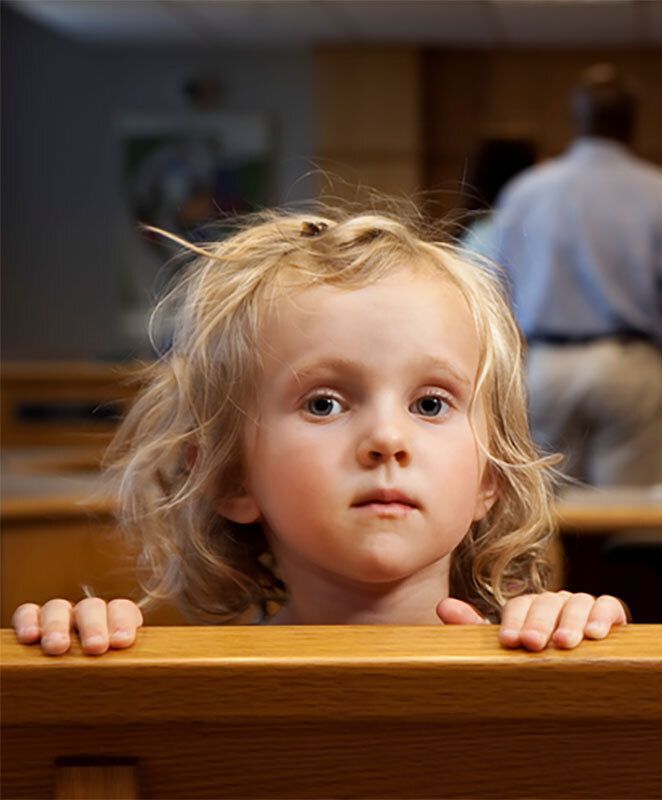 Little girl in a courtroom.