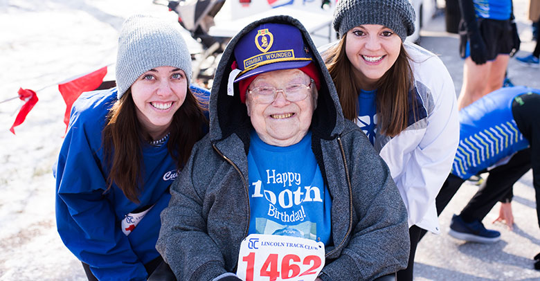 Clarence Osborn with his nurses at the Tabitha 10K