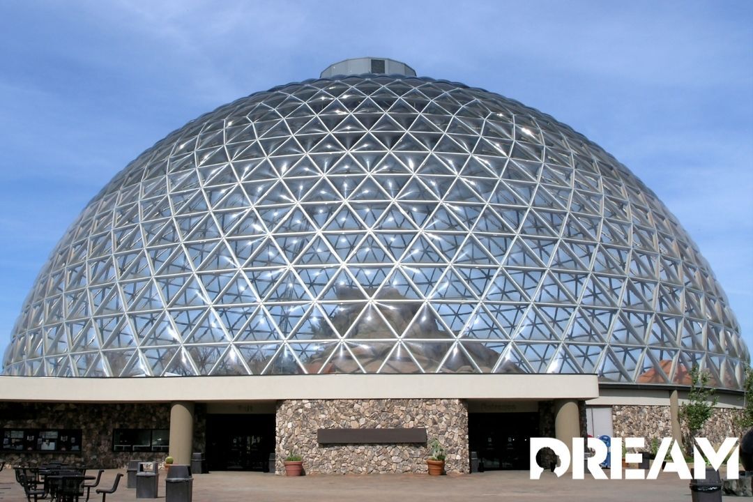 Desert Dome exhibit at the Henry Doorly Zoo in Omaha, Nebraska; a glass-shaped dome holds plants and animals native to the deserts and the landscape matches that