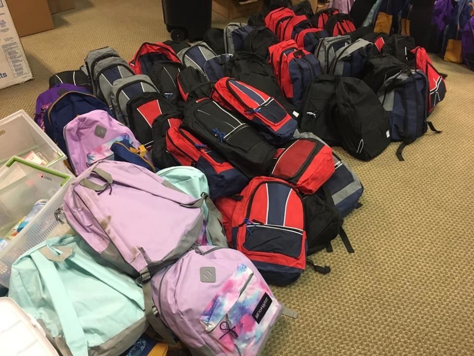 pile of backpacks.