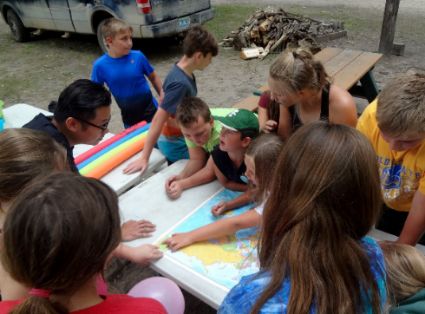 Colin working with Michigan youth at 4-H Camp Kidwell.