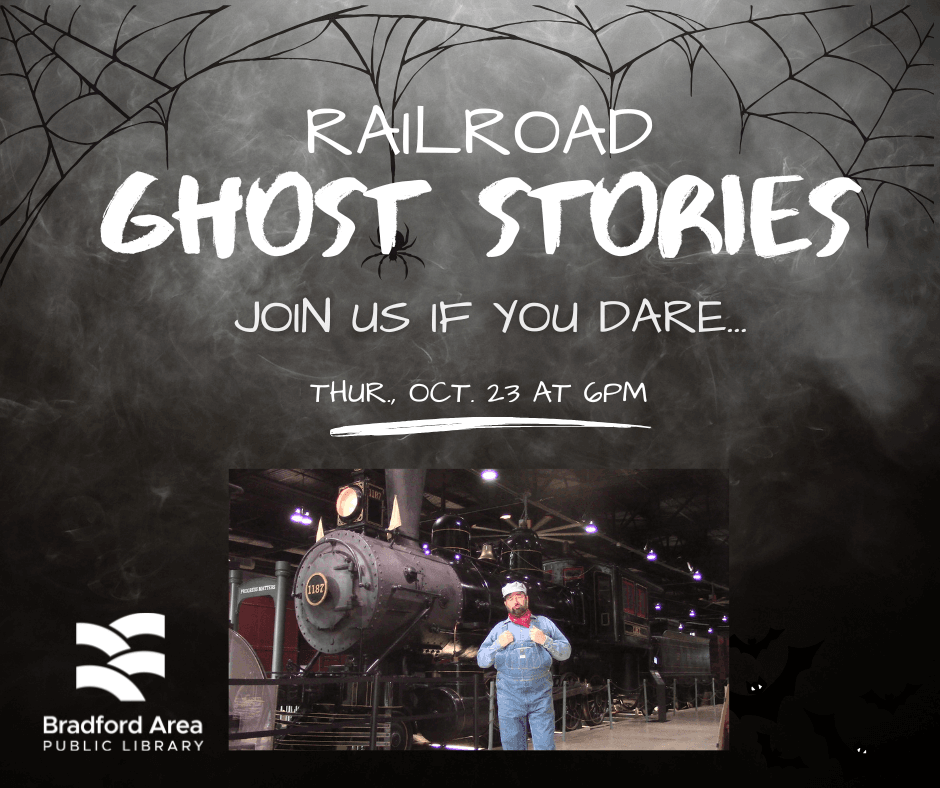 Train engineer standing beside a steam locomotive.