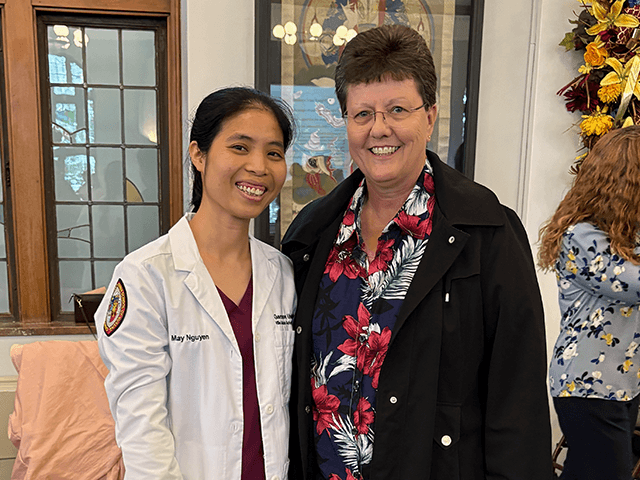 Sister May receives white coat