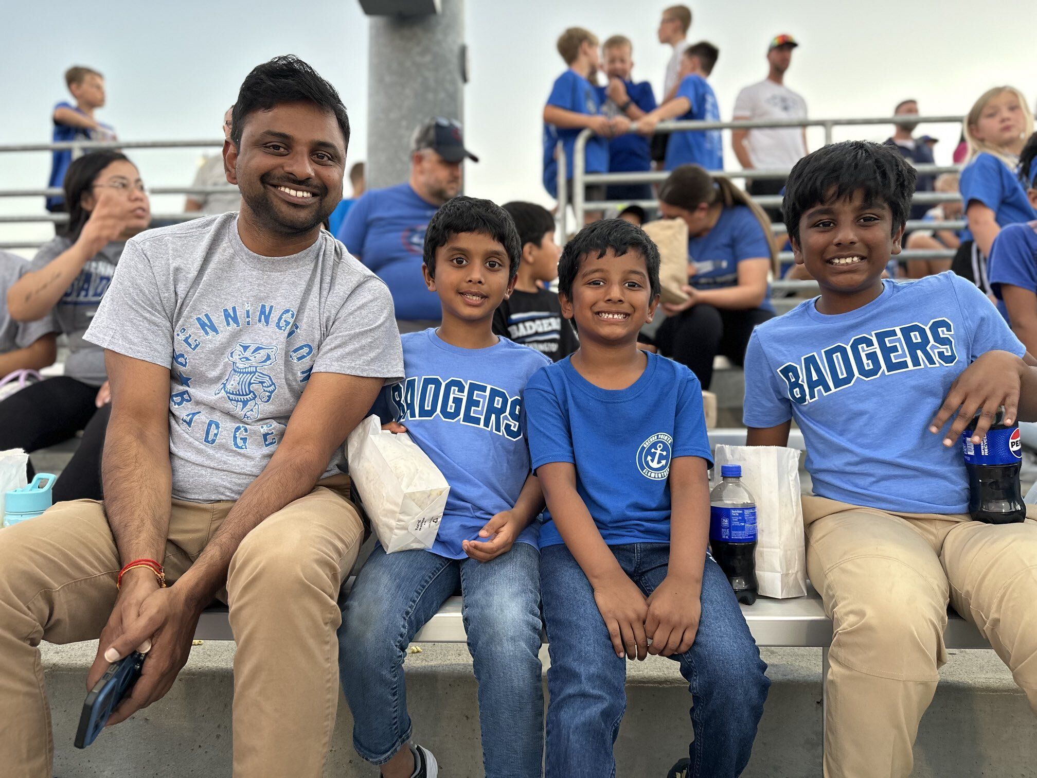 English Language Learning students and families attend Bennington High School football game.