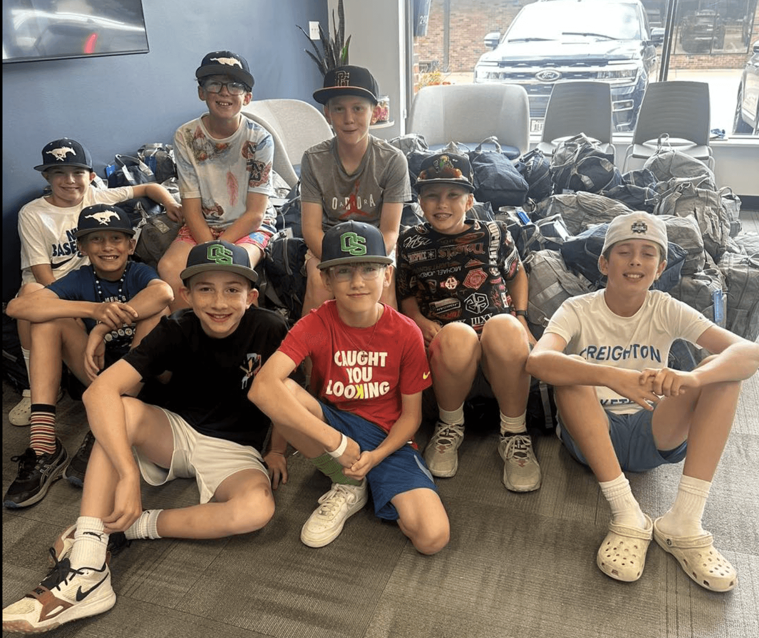 Baseball team assembles layettes