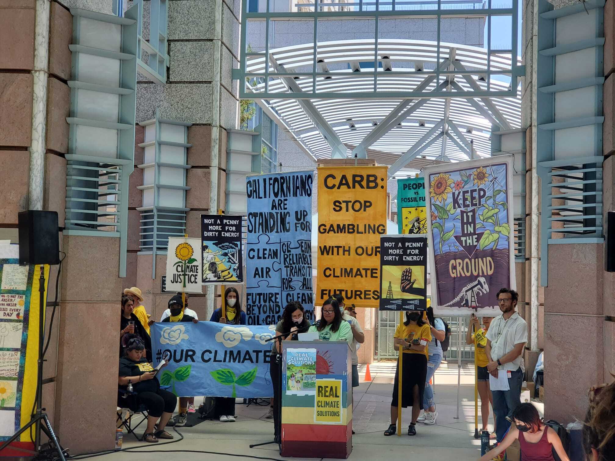 Irma Lopez speaking at the Our Climate Future rally