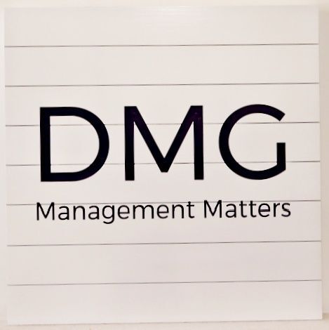 S28028 - Carved and Sandblasted HDU Sign for "DMG"