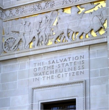 Inside Nebraska State Capitol carved in the stone wall "The Salvation of the state is watchfulness in the citizen"