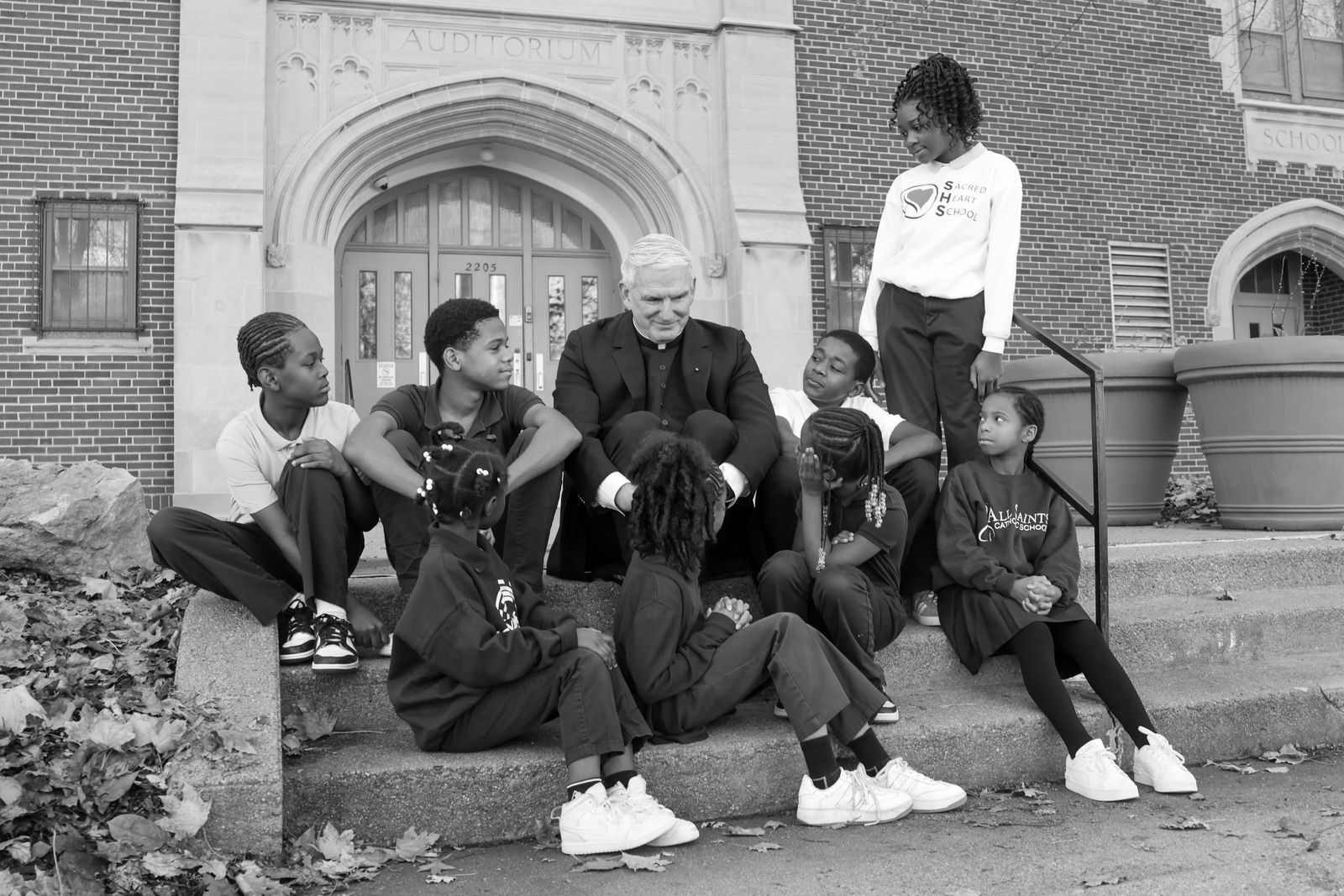 Students with a priest