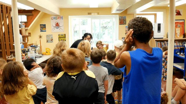 Science Hero Jerry sets off a cannon to the cheers and excitement of children.