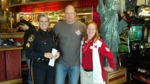 Local Law Enforcement Trade in Handcuffs for Aprons to Support our Athletes!