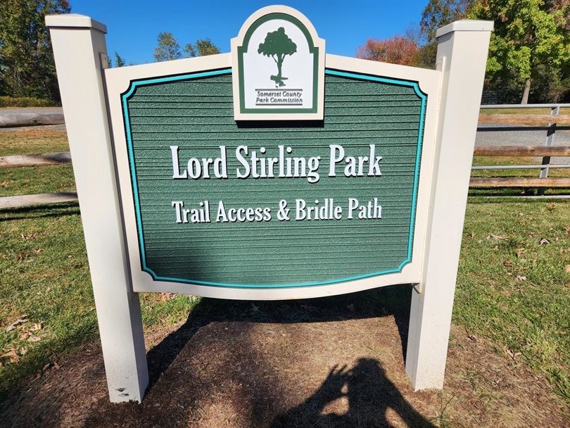 G16099A - Large Carved 2.5-D Multi-level and Sandblasted Wood Grain HDU  Trail Entrance Sign for Lord Stirling Park, Supported by Two Aluminum Posts