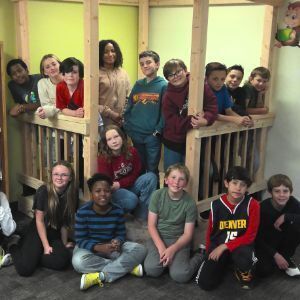 Fifth-grade students at Trails West build library reading nook